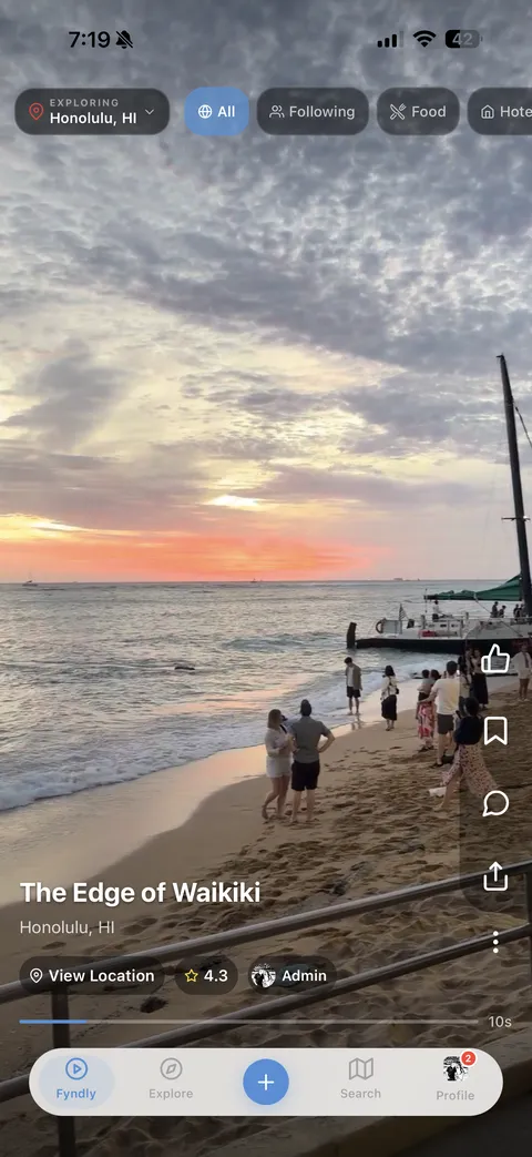 Fyndly Home Feed showing a video of The Edge of Waikiki beach at sunset